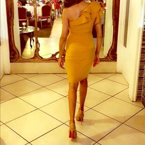 Mustard one shoulder party dress.